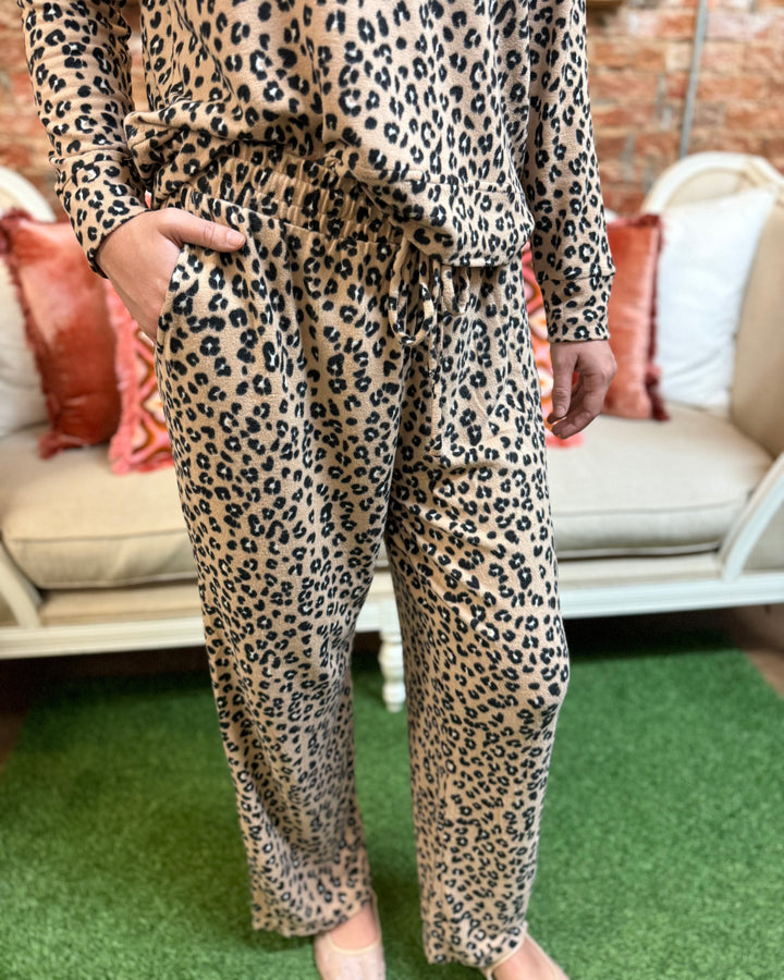 Sophie Leopard Print Pajama Set featuring soft fabric and a relaxed fit; available in sizes XS to XL.