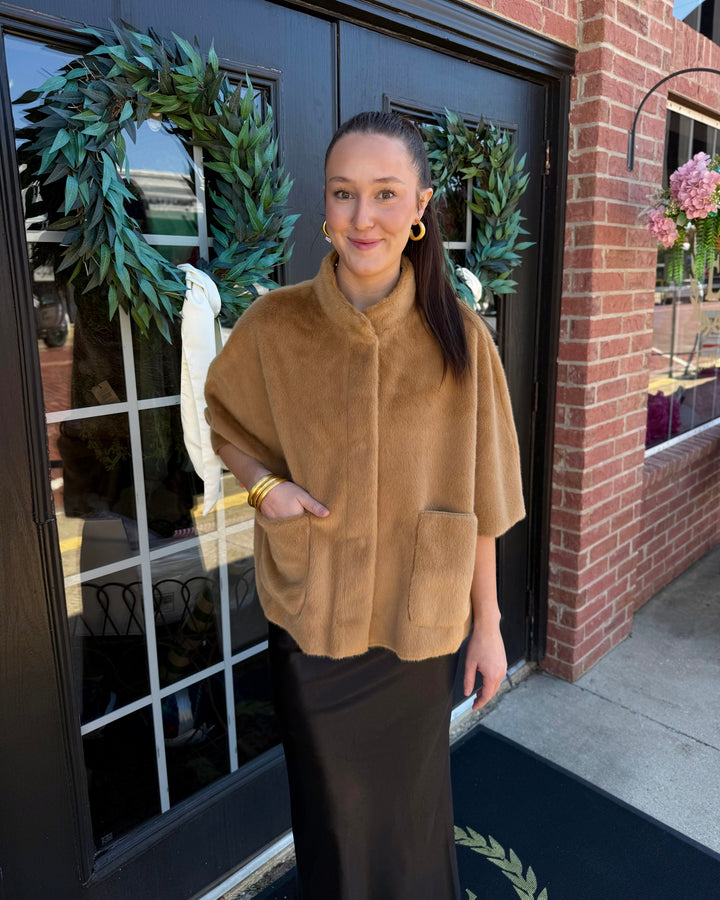 Tan Arabella Faux Fur Capelet with high collar and two front patch pockets. Available in sizes S-L.