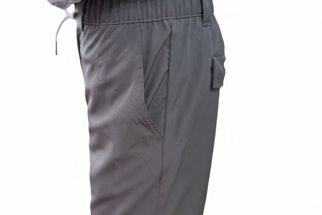 Men’s Khaki Drawstring Shorts with elastic waistband, side pocket, and back flap pocket. Available in S, M, L, XL.
