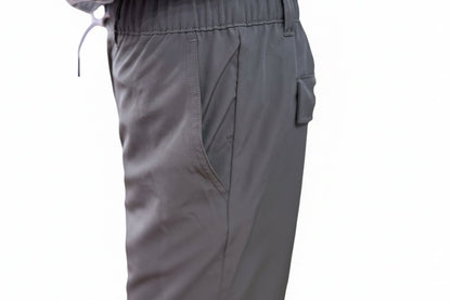Men’s Khaki Drawstring Shorts with elastic waistband, side pocket, and back flap pocket. Available in S, M, L, XL.