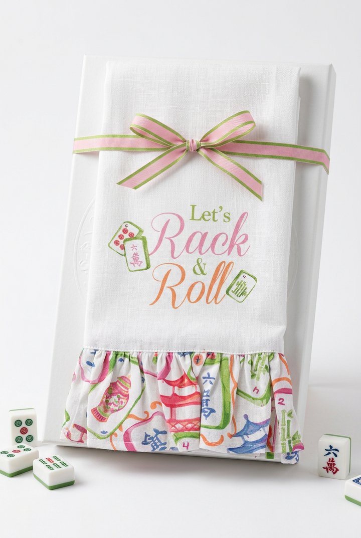 Rack &amp; Roll Ruffled Hand Towel, white ruffled towel with “Let’s Rack &amp; Roll” text and green and pink ribbon.