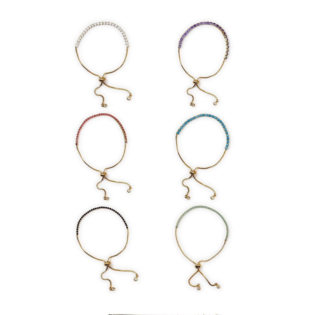 Six adjustable Dazzle Bracelets with rhinestones in white, purple, pink, blue, black, or green. Sizes: S/M/L.