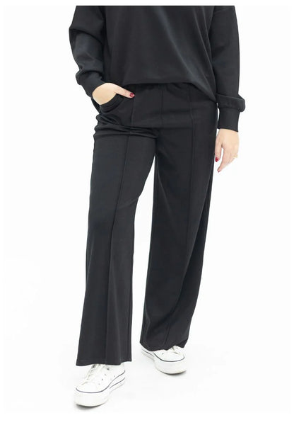Black Butter Soft Pants with wide-leg silhouette, available in sizes XS-XL.