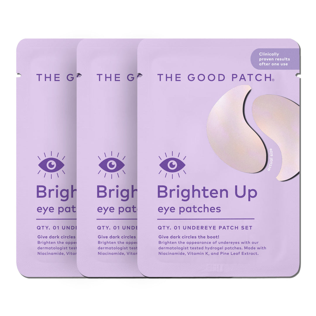 Three lavender Brighten Up Patch hydrogel under eye patch packets, each with an eye icon. Sizes available: single-use.