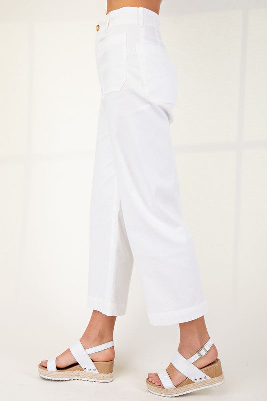 High-waisted, ankle-cropped summer pants in stretchy denim-like fabric; available in sizes XS-XL.