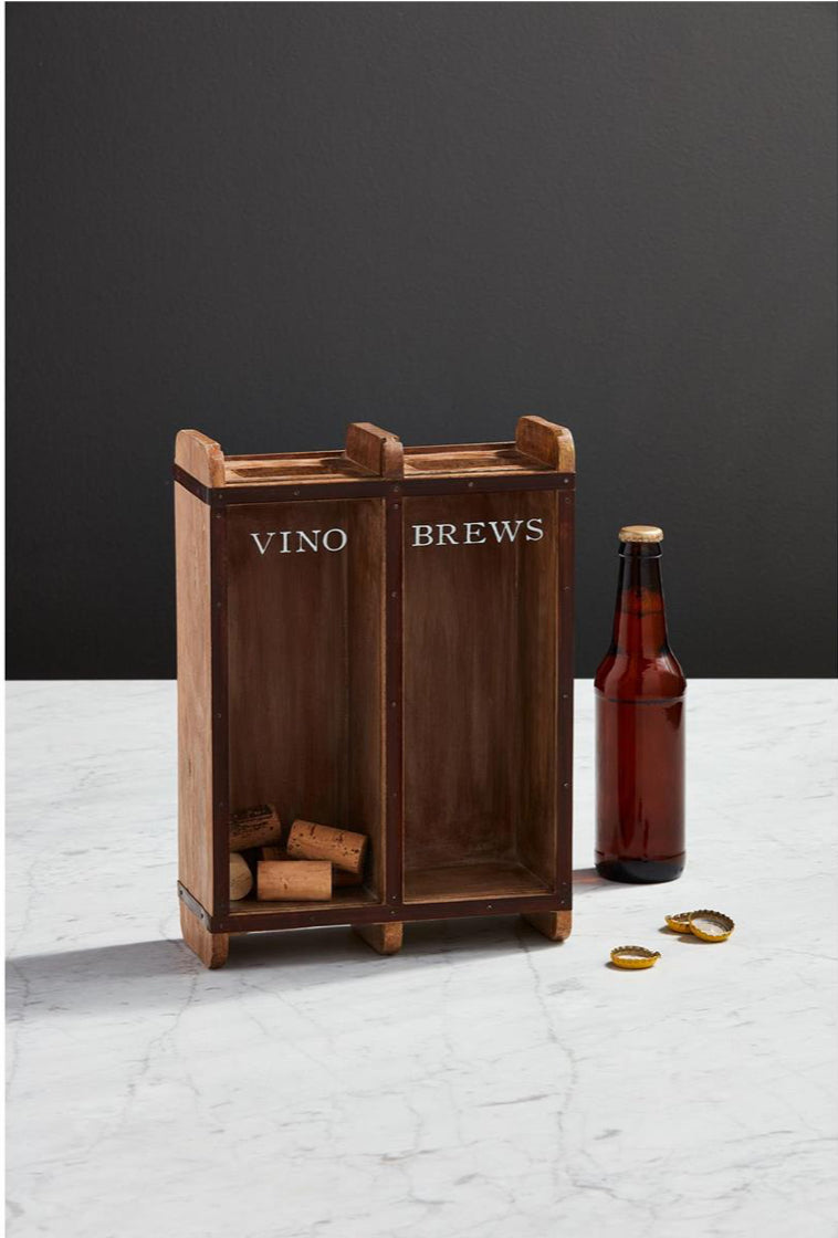 The Vino &amp; Brews Cap is a 12.5" x 9" mango wood box with "VINO" and "BREWS" sections for corks and caps.