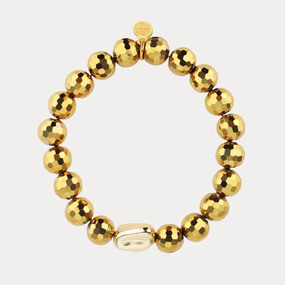 The Disco Bracelet features shiny, faceted gold-colored resin beads, a smooth oval accent bead, and a small BuDhaGirl charm. Available in multiple sizes.