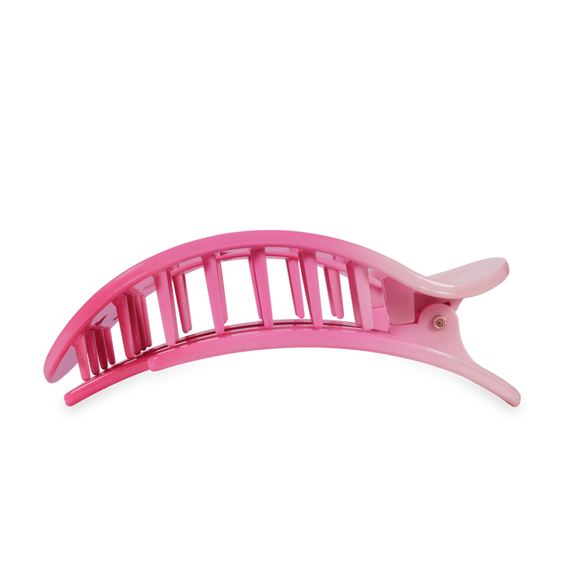Pink, curved, open-slotted Kiss and Tell Teleties hair clip. Available in small, medium, and large sizes.