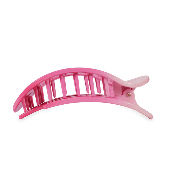 Pink, curved, open-slotted Kiss and Tell Teleties hair clip. Available in small, medium, and large sizes.