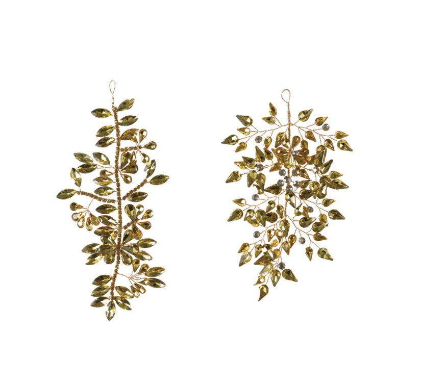 Two gold wire and faceted leaf-shaped acrylic gem ornaments.