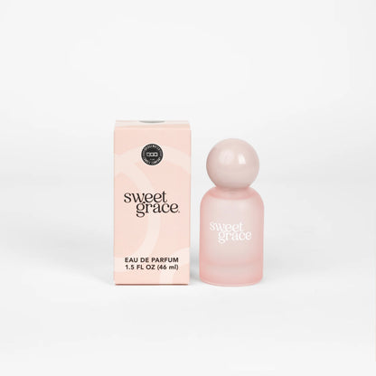 Sweet Grace Eau de Parfum, 1.5 fl oz (46 ml). Pale pink box and matching bottle. Scent notes: exotic passion fruit, classic patchouli.