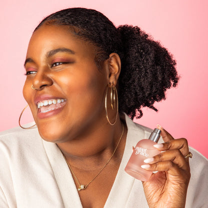 Sweet Grace Eau de Parfum – a captivating fragrance featuring notes of classic patchouli. Available in 10 ml and 65 ml sizes.