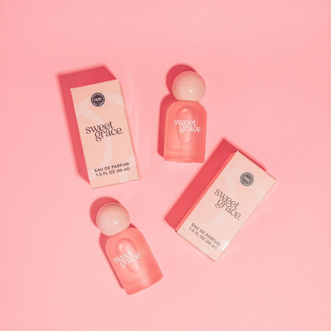 Sweet Grace Eau de Parfum features vibrant exotic passion fruit notes in an elegant, minimalist bottle. Available sizes: 8.8 ml, 60 ml.