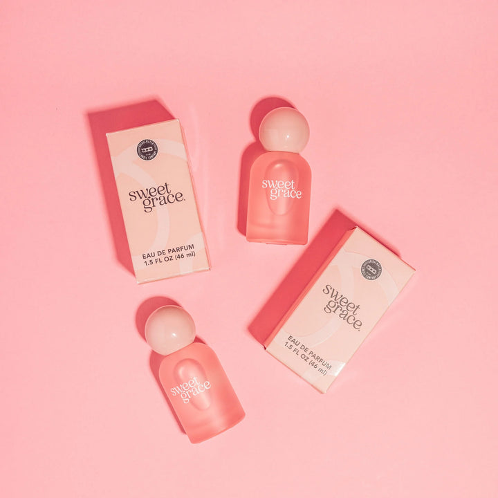 Sweet Grace Eau de Parfum features vibrant exotic passion fruit notes in an elegant, minimalist bottle. Available sizes: 8.8 ml, 60 ml.