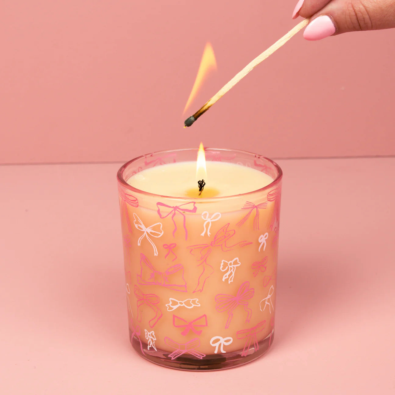 Sweet Grace Collection Pink Bow Candle #072, soy-blend wax in glass with pink bows; available in 8oz and 16oz sizes.