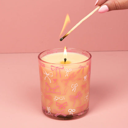 Sweet Grace Collection Pink Bow Candle #072, soy-blend wax in glass with pink bows; available in 8oz and 16oz sizes.