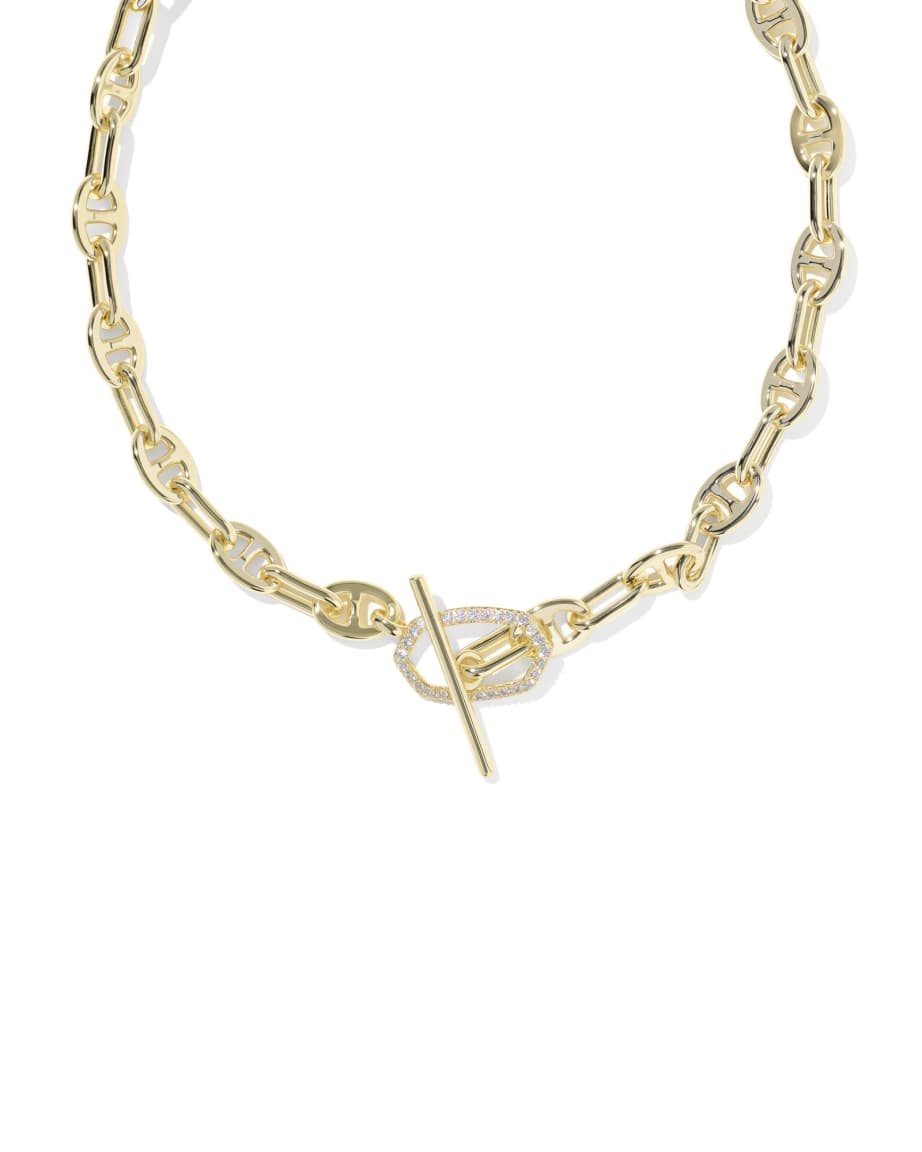 Gold necklace with oval links, a toggle clasp, loop accented by small white stones. Available in multiple sizes.