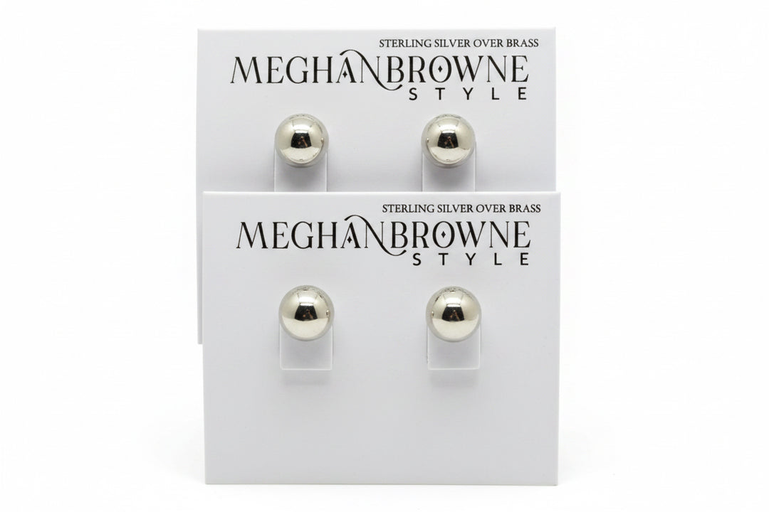Zola Silver Earrings in a minimalist silver ball stud design, available in two sizes.