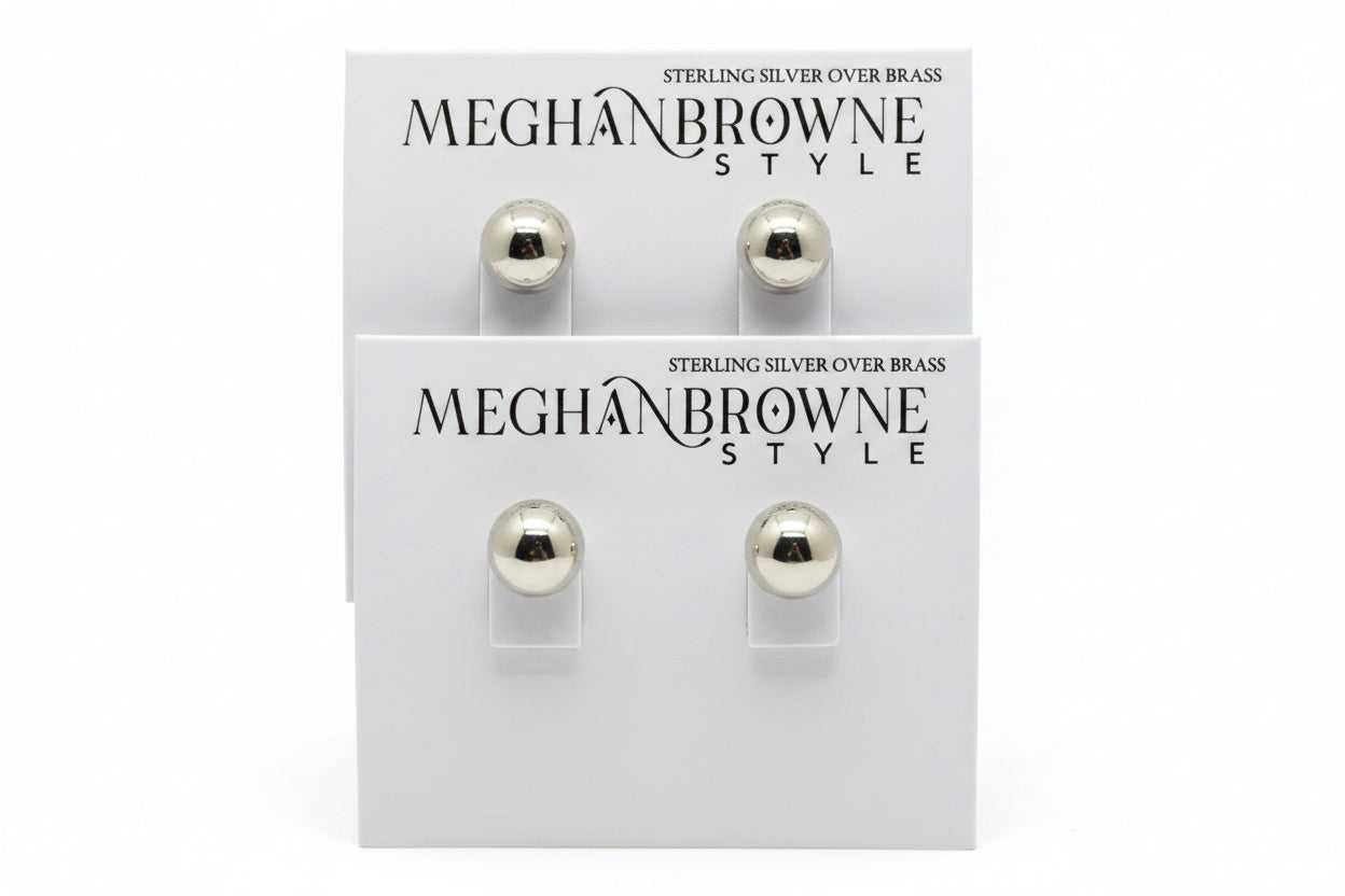 Zola Silver Earrings in a minimalist silver ball stud design, available in two sizes.