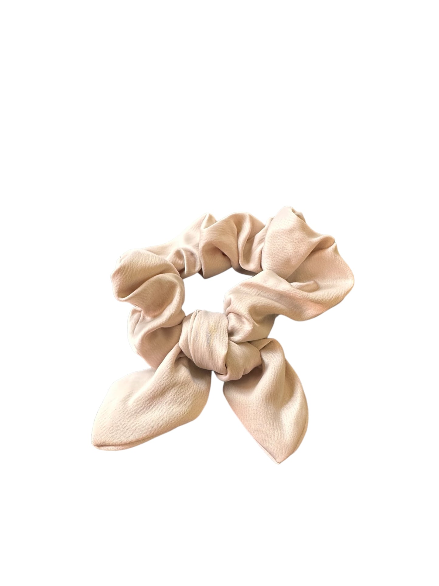 Light beige Bow Scrunchie with two loose ends resembling bow tails, showcasing a cute bow design. Sizes: One size fits all.