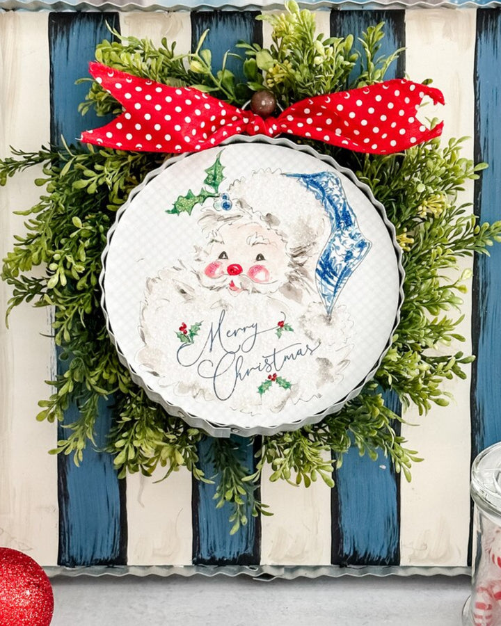 Mini Gallery Art Beck’s Blue Santa round metal sign with vintage-style blue Santa illustration. Available in multiple sizes.