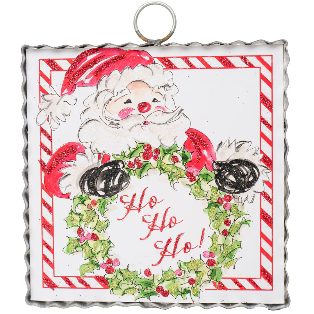 Mini Gallery Art Beck’s HoHoHo Santa square metal holiday decor featuring Santa Claus holding a holly wreath with “Ho Ho Ho” text.