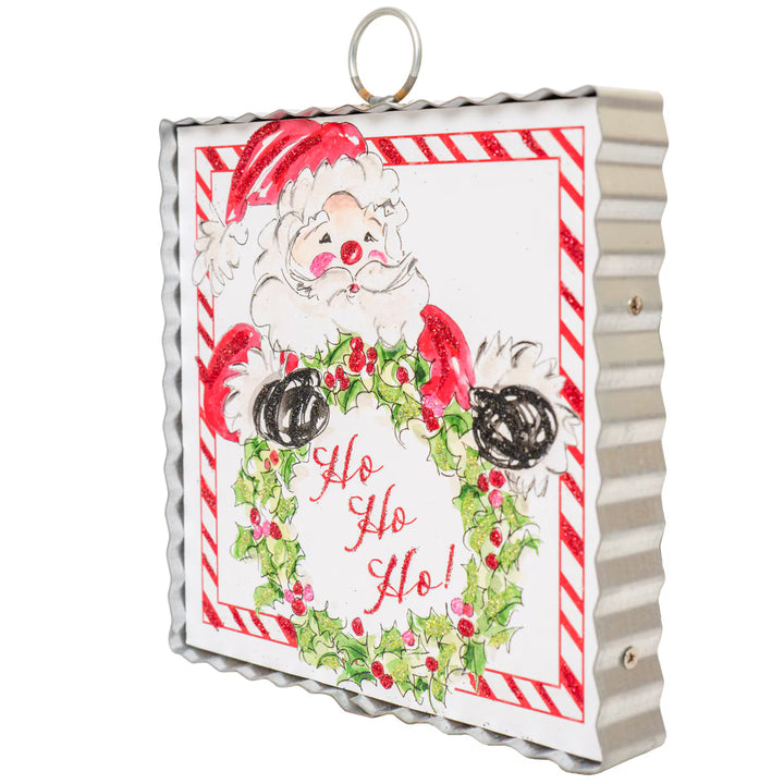 Mini Gallery Art Beck’s HoHoHo Santa, a square decorative sign featuring Santa holding a holly wreath with the text “Ho Ho Ho!” inside a red-striped frame.