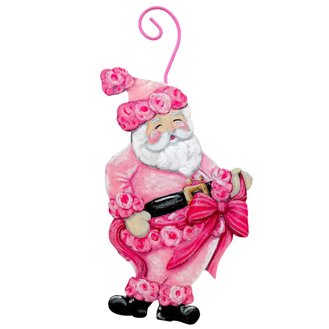 Fanciful Pink Santa Ornament in a pink, rose-patterned suit and matching hat, holding a red bow.