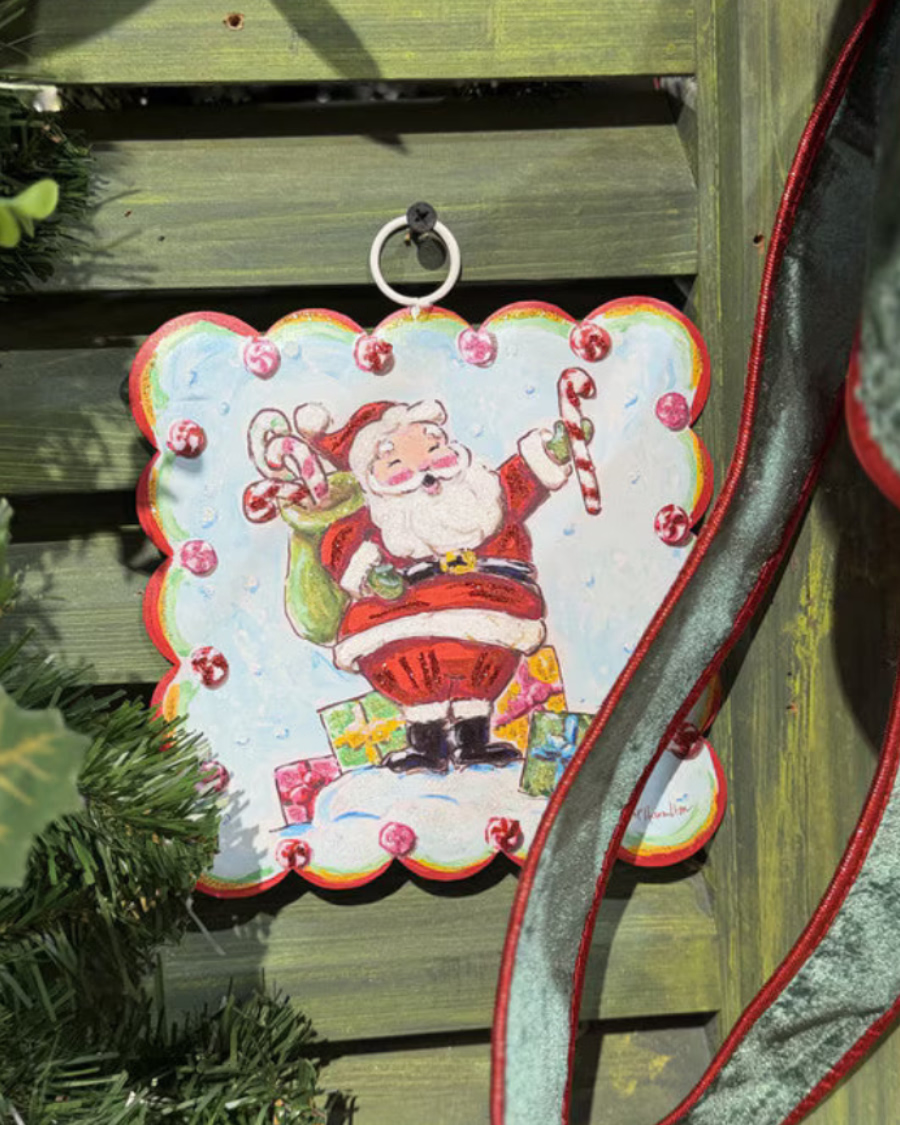 Mini Scallop Art Belly Laugh Santa square hanging ornament featuring Santa with a candy cane and sack of gifts.