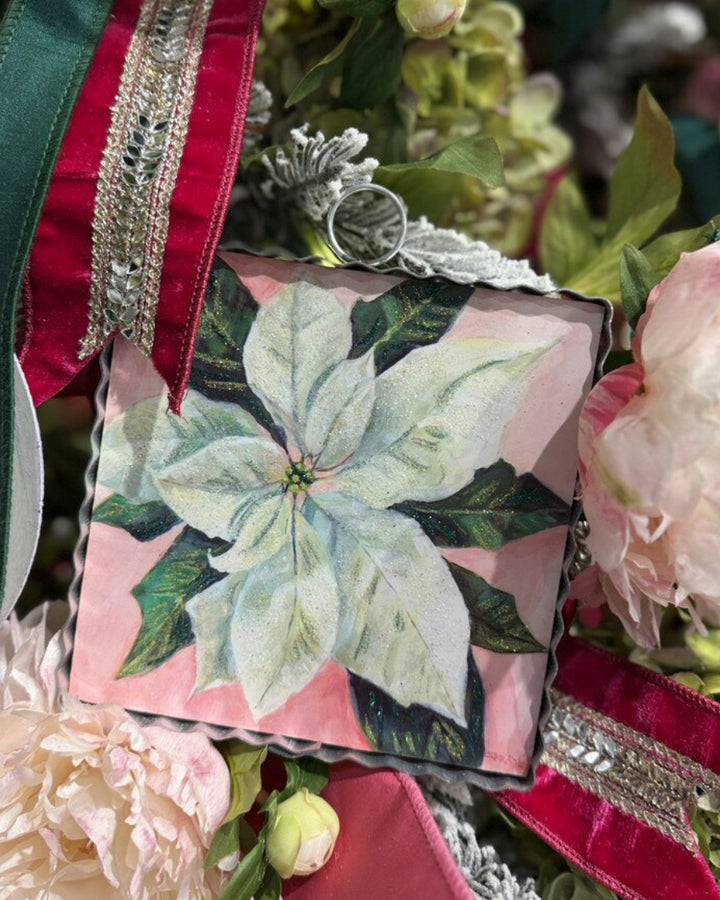 Mini Gallery Art White Poinsettia square ornament with silver scalloped edge.