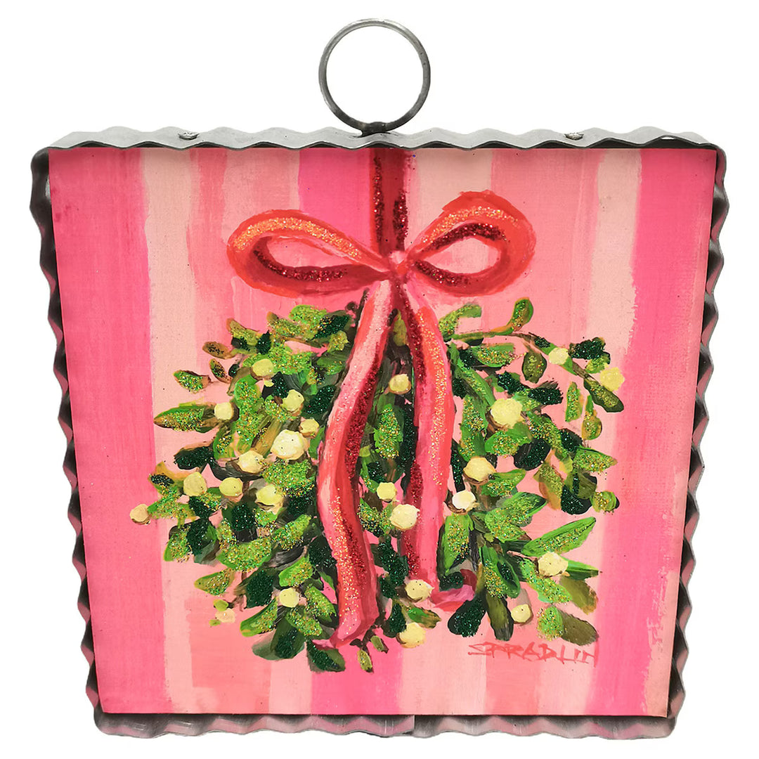 Mini Gallery Art Mistletoe square sign featuring a corrugated metal border, mistletoe art, a red glitter bow, and a metal hanging loop.