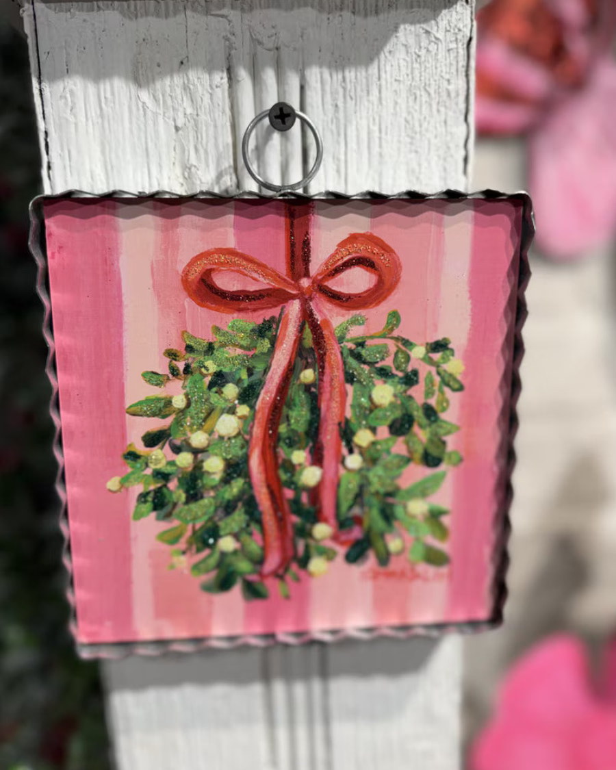 Mini Gallery Art Mistletoe square metal sign featuring mistletoe art tied with a red ribbon. Available in square sizes.