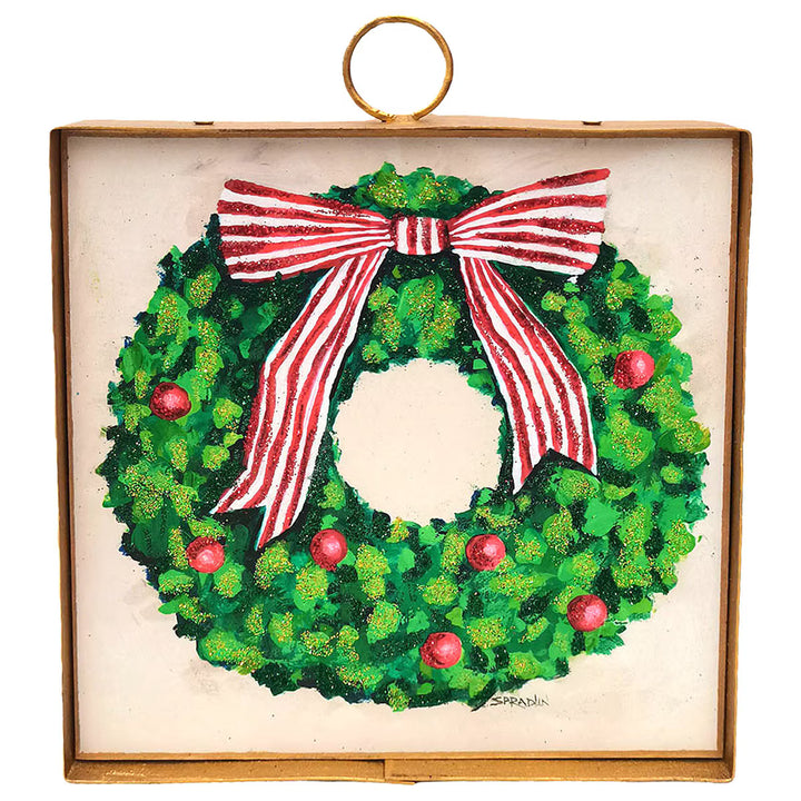 Mini Gallery Art Green Wreath with Red Ornaments, a square artwork with a green wreath, red ornaments, and a red-and-white striped bow in a gold metal frame.