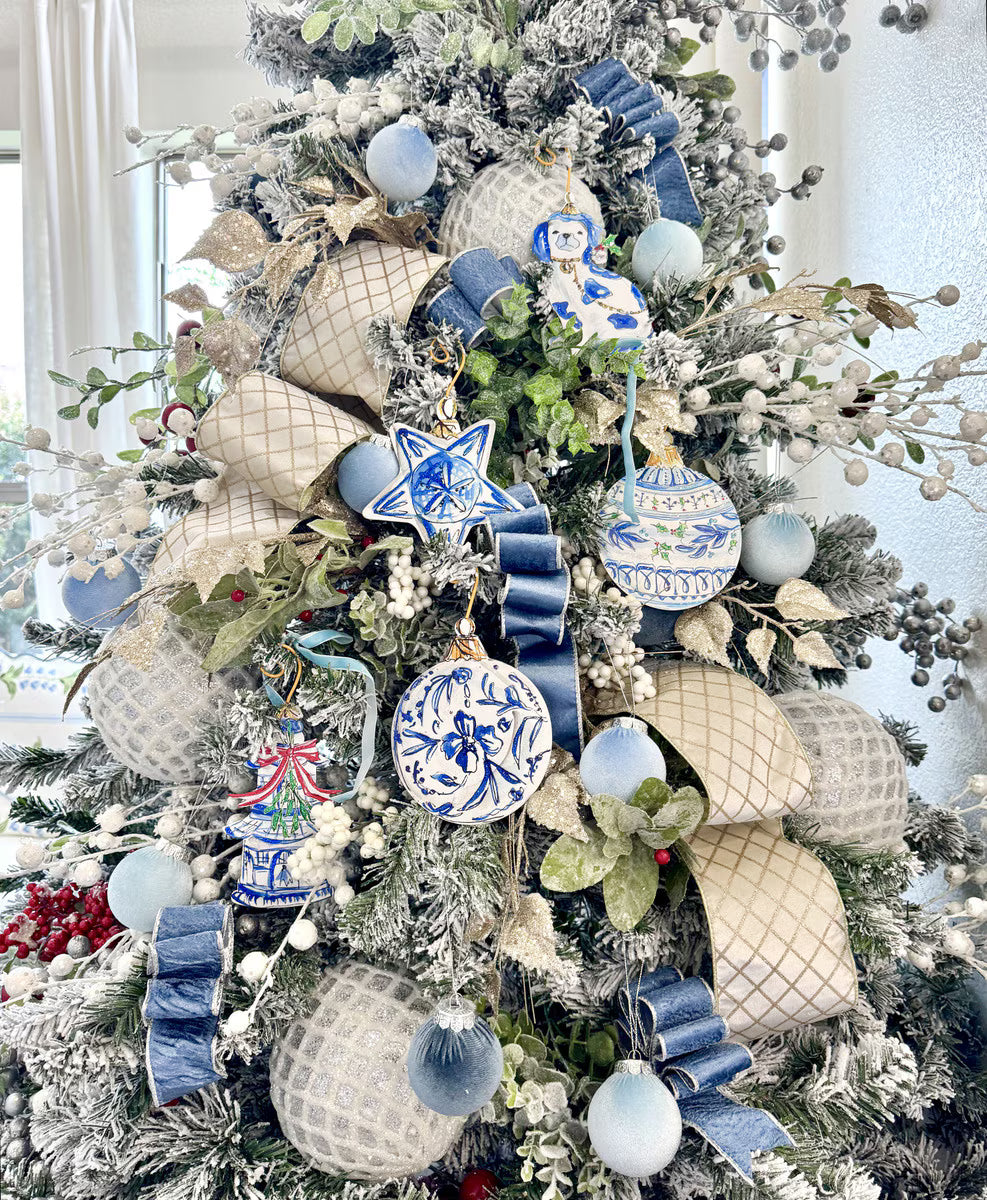 Five blue Beck’s Chinoiserie Ornaments in 5 styles: a star, a pagoda, a dog, and two spheres.