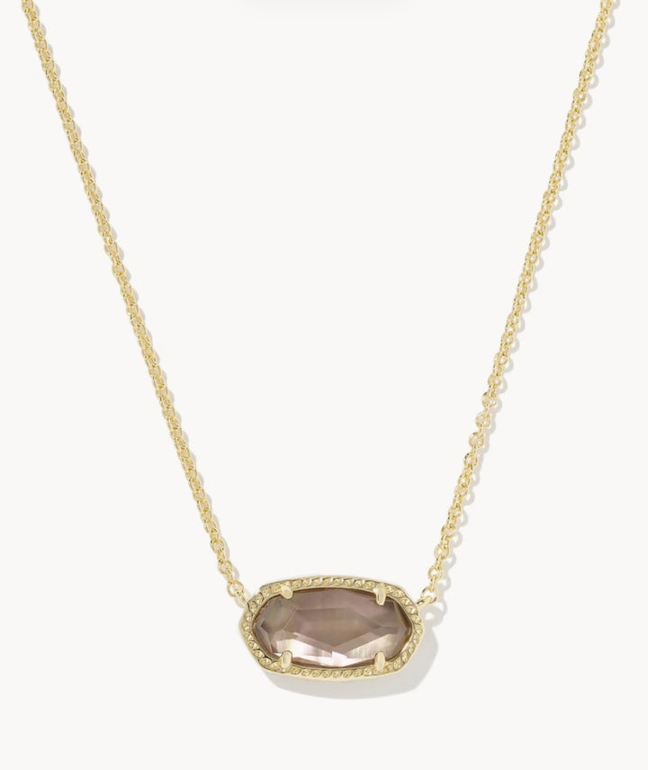 The Elisa Necklace Gold Taupe by Kendra Scott features an oval, faceted light brown stone in a textured gold frame. Short pendant necklace. Available in one size.