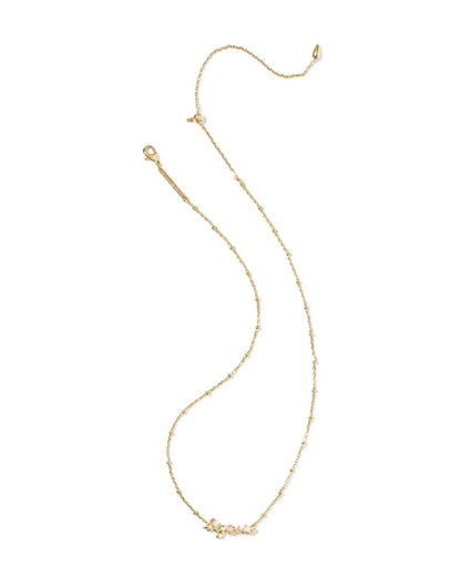 The Big Sis Necklace by Kendra Scott features a delicate gold chain with small textured beads, a lobster clasp, and a petite charm. Available in 16" and 18" lengths.