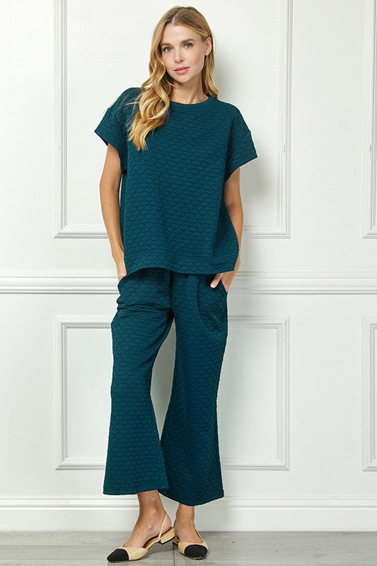 Teal Honey Comb Textured Set with short-sleeve top and wide-leg pants. Available in sizes XS-XL.