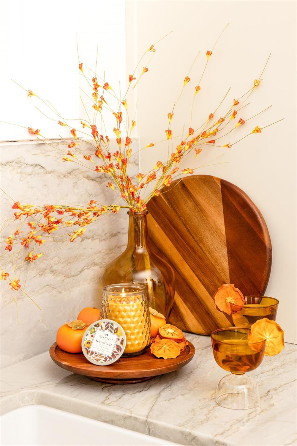 13 oz Harvest Gold Signature Candle available; amber glass design with autumnal tones. Other items not included.