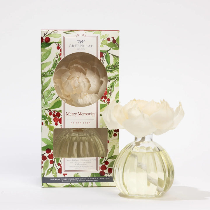 Merry Memories Flower Diffuser with a sugared pear flower-shaped reed and glass base.