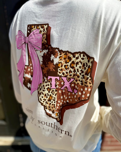 Texas Animal Print Long Sleeve with Texas state outline in animal prints, “TX” label, pink bow graphic, and Simply Southern Collection branding on the back. Available in sizes S-XXL.