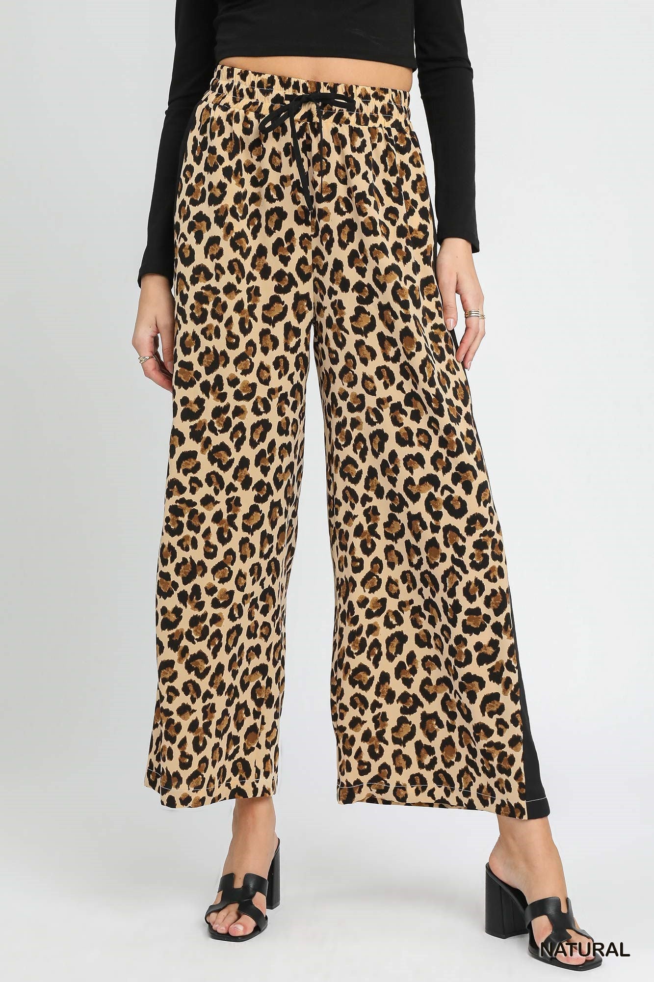 Leopard Print Wide-Leg Drawstring Pants. Sizes: XS-XL. Relaxed fit, ideal for lounging.