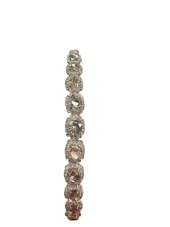 Crystal headband with round gemstones in oval settings, single row. Available sizes: small, medium, large.