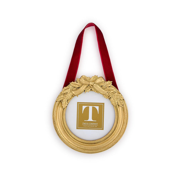 Holly Leaves Ornament Photo Frames: round gold-tone frame with holly leaves and bow on a red ribbon.