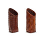 Chestnut woven leather eyeglass holders with upright, angled openings; available in small and large sizes.