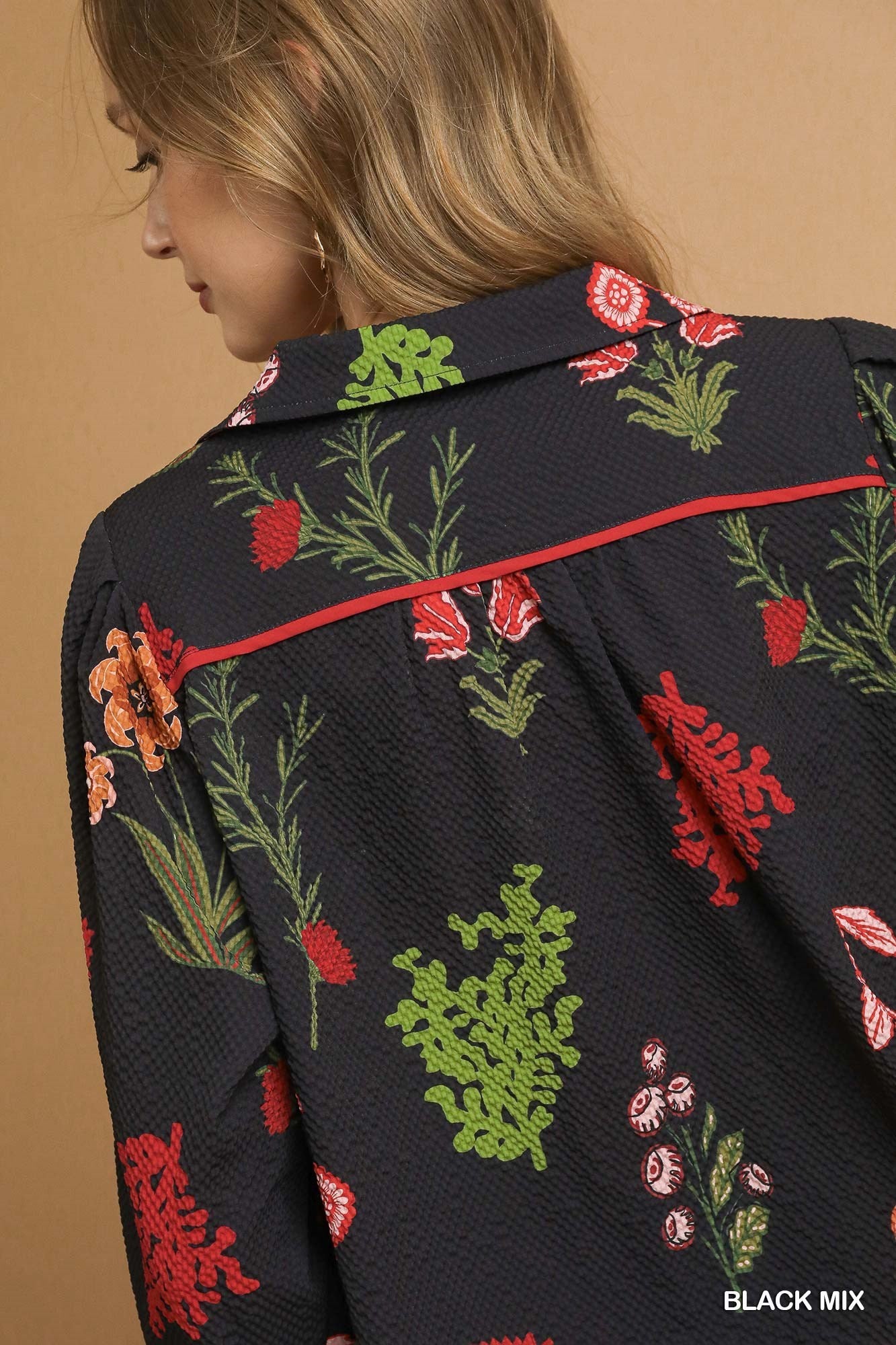 Black Floral Print Scallop Hem Textured Top with red, green, orange accents, wide collar, scalloped hem. Sizes: XS-XL.