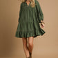 Juniper Tiered Long Sleeve Dress in olive; available in sizes XS-XL. Features tiered design and long sleeves.