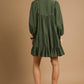 Juniper Tiered Long Sleeve Dress in olive green with ruffle details. Available in sizes XS–XL.