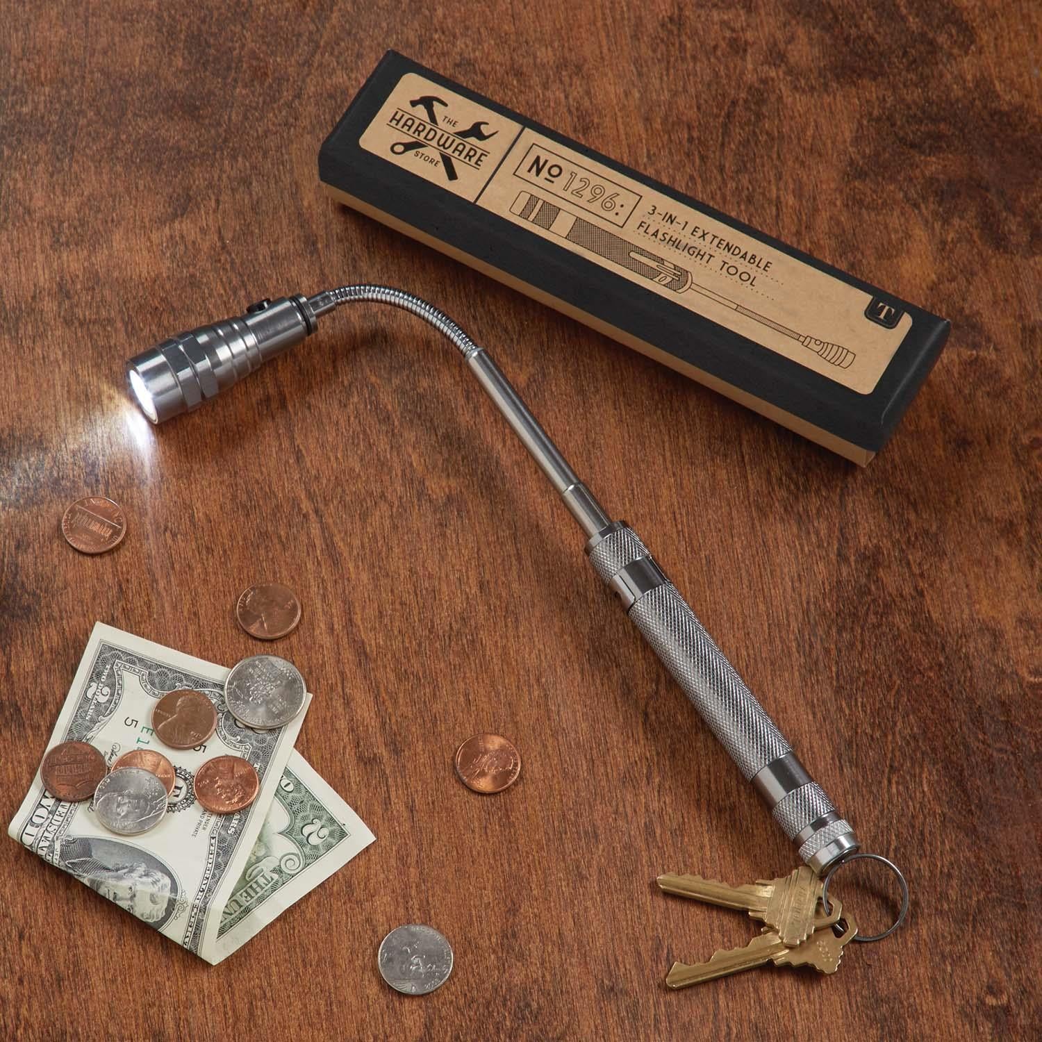 Extendable Flashlight Pick-Up Tool in gift box, lit, attached keyring. Available sizes: 6–22 inches.