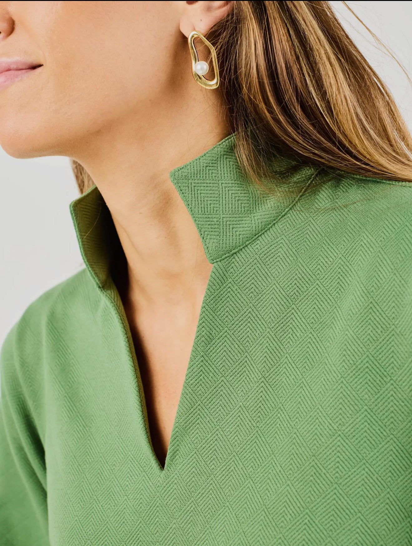 Hadley Green Dress with textured fabric, standing collar, V-neck; available in sizes XS–XL.