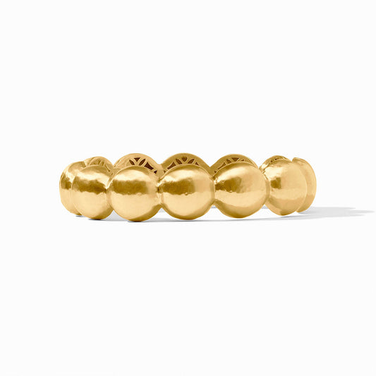 The Solara Nova Hinge Bangle is a 24K gold bracelet with large, smooth rounded beads. Available in small, medium, and large.